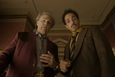 AP / Warner Bros. Tom Cruise, left, and Riz Ahmed star in Alejandro G. Iñárritu’s satire “Digger.”
